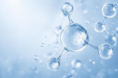 Mavero Molecular structure with water droplets on a light blue background